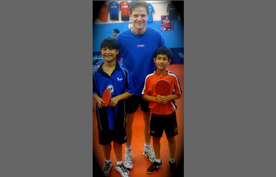 Coach Stefan with Jonathan Ou and Kanak Jha 