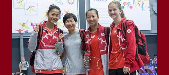 left to right: Mo Zhang, Coach Junya Chen, Anqi Luo & Alicia Cote Photo by Thorsten Gohl